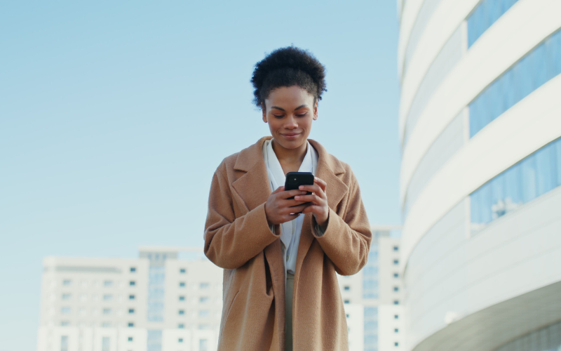 5 woman on phone in the city